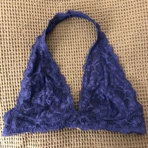 Olive, rose, cream, and blue/purple lace bralettes